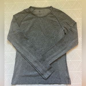 Like new. Figs underscrub. Size Large